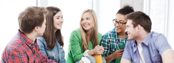 Five students speaking English together